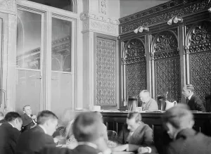 Examining Prints: Hennessy examining Delaney, 1913. Creator: Bain News Service