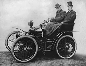 Herbert Austin at tiller of first 4 wheel Wolseley 1899. Creator: Unknown Herbert Austin at tiller of first 4 wheel Wolseley 1899. Creator: Unknown