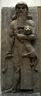 Assyrian Art Gallery: Hero Gilgamesh mastering a lion, 722-705 BC. Artist: Assyrian Art