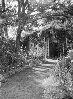 Tranquillity Prints: Herter, Albert, garden, between 1932 and 1942. Creator: Arnold Genthe