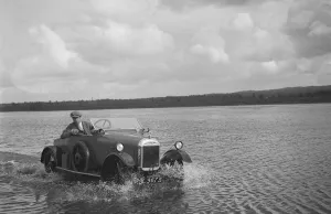 Common Prints: HG Pope driving a GWK through water at a demonstration event