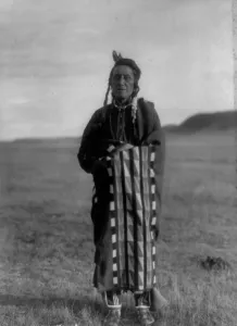 Minatarree Prints: Hidatsa man, c1908. Creator: Edward Sheriff Curtis