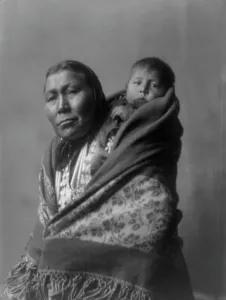 Minatarree Prints: Hidatsa mother, c1908. Creator: Edward Sheriff Curtis