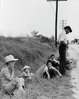 Possessions Prints: A hitchhiking family waiting along the highway in Macon