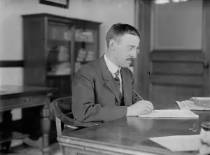 Stimson Henry Lewis Prints: H.L. Stimson at desk writing, 1910. Creator: Bain News Service