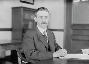 Stimson Henry Lewis Prints: H.L. Stimson at desk writing, 1910. Creator: Bain News Service