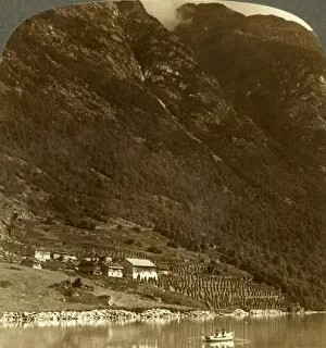 Underwood Travel Library Gallery: Hogrending farm, nestling at the mountains base, on the E. shore of Lake Loen, Norway, c1905