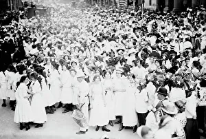Schoolgirls Prints: Hoisting flag - Wash. High School, between c1910 and c1915. Creator: Bain News Service