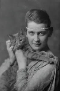 Holch, Anna, Miss, with Buzzer the cat, portrait photograph, ca. 1913. Creator: Arnold Genthe