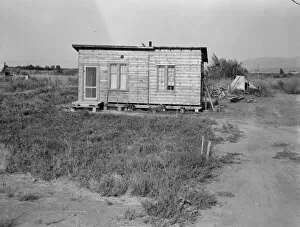Refugee Gallery: Homes are built bit by bit with whatever materials are available, Yakima, Washington, 1939