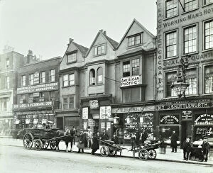 Shop Window Collection: Horse drawn vehicles and barrows in Borough High Street, London, 1904