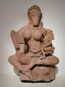 Hindu Prints: Horse-Headed Yogini Hayagriva Seated Holding a Child, 11th century. Creator: Unknown
