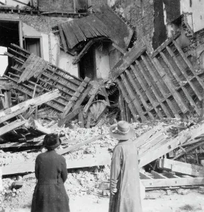 House destroyed by a bomb, Armentieres, France, World War I, c1914-c1918. Artist: Nightingale & Co