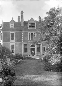 Woodlands Prints: House and garden, c1900. Creator: Kirk & Sons of Cowes
