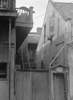 French Quarter Prints: Houses in the French Quarter, New Orleans, between 1920 and 1926. Creator: Arnold Genthe