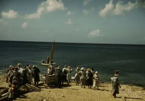 Housewives at the seashore waiting for the fishing boats to come in Frederiksted, V. I. 1941. Creator: Jack Delano