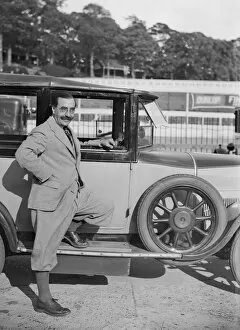 Barc Gallery: Hugh McConell beside a car, Brooklands, 3 August 1931. Artist: Bill Brunell