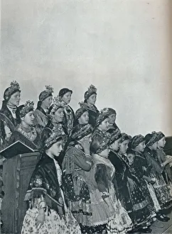 Hungarian Peasant Girls Singing in Church, c1932. Artist: Rudolf Balogh