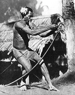 Images Dated 13th November 2007: A huntsman stringing his bow, 1936.Artist: Wide World Photos