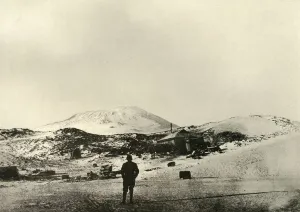 The Hut, with Mount Erebus in the Background, in the Autumn, 1908, (1909)
