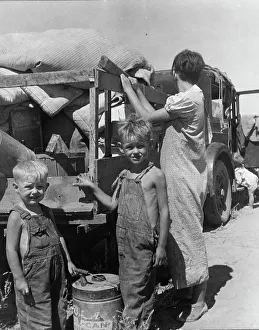 Possessions Prints: Part of an impoverished family of nine on a New Mexico highway