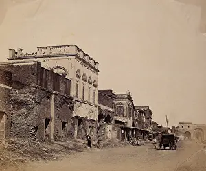 India: a ruined street showing the house in which the king was confined, c1858. Creator: Felice Beato