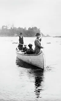 Canoeing Prints: Two Indian guides(?) standing, and two women seated