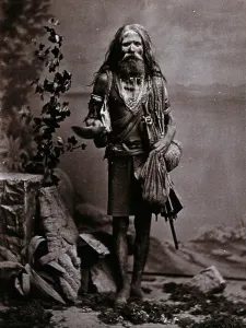 Sadu Prints: An Indian man wearing many beads