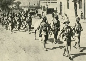 Infantry Prints: Indian soldiers and British officer, First World War, 1914-1918, (c1920). Creator: Unknown