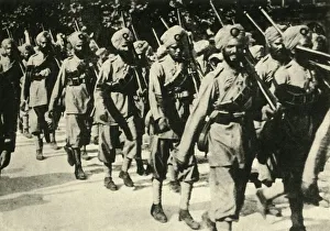 Marching Prints: Indian soldiers in France, First World War, 1914, (c1920). Creator: Unknown