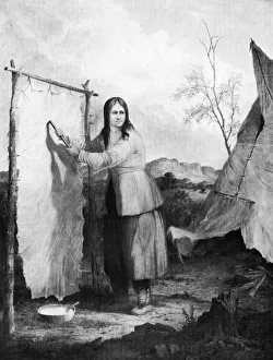 Indian Woman Dressing a Deer Skin, 1868. Artist: Seth Eastman