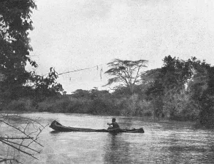 Angola Prints: Indigene de l'Angola naviguant sur un fleuve; Afrique Australe, 1914. Creator: Unknown