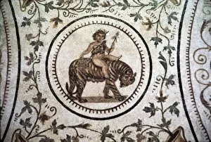 Dionysius Collection: Infant Dionysus Riding on a Tiger, Roman mosaic detail at El Djem, Tunisia. c2nd century