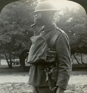 Images Dated 9th April 2009: Infantry fitted with the latest gas marks and steel helmets, World War I, 1915-1918.Artist
