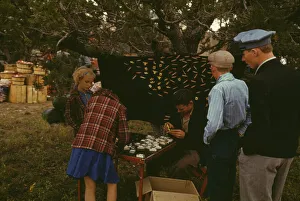 Souvenirs Prints: Initial pin souvenirs at the Pie Town, New Mexico Fair, 1940. Creator: Russell Lee