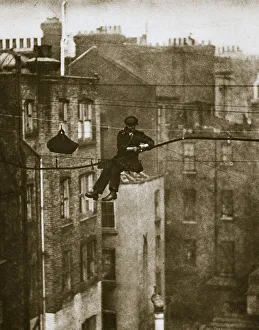 Inspecting a telephone cable between Conduit and Maddox Streets, 20th century. Artist Inspecting a telephone cable between Conduit and Maddox Streets, 20th century. Artist