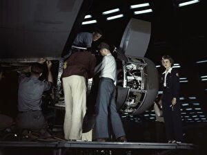 Engine Gallery: Installing an engine at the Consolidated Aircraft Corporation plant, Fort Worth, Texas, 1942