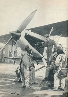 Air Force Prints: An instructor explaining engine details to a pupils at Sealand Aerodrome