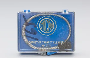 Instrument cleaning snake and case belonging to Maxine Sullivan, ca. 1936 Instrument cleaning snake and case belonging to Maxine Sullivan, ca. 1936