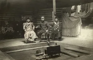 Siberian Prints: The interior of a Buryat yurt. In the center is a householder with two wives