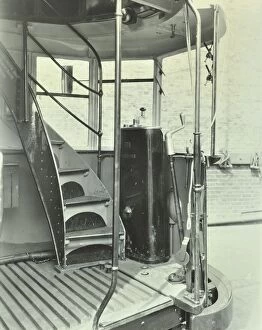 Interior of an electric tram showing driver controls, 1931