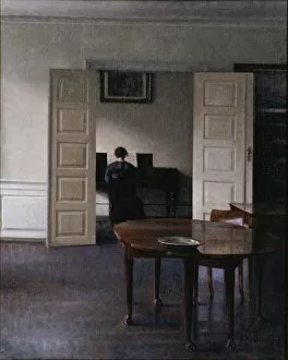 Living Room Gallery: Interior with Ida Playing the Piano. Artist: Hammershoi, Vilhelm (1864-1916)