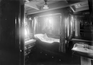 Cabin Prints: Interior of midships cabin on steam yacht Venetia, 1920. Creator: Kirk & Sons of Cowes