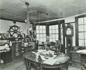 Greenwich Prints: Interior of an office with a man on the telephone, Greenwich, London, November 1936