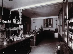 Laboratory Prints: The interior of a pharmaceutical or chemical laboratory... c1890s. Creator: Unknown
