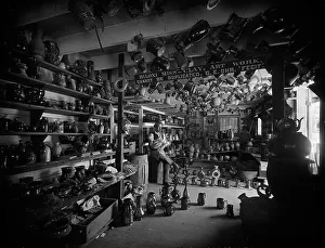Shop Owner Prints: Interior of the pottery, Biloxi, Miss. c1901. Creator: Unknown