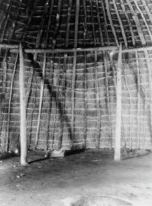 Grass Hut Prints: Interior of Wichita grass-house, c1927. Creator: Edward Sheriff Curtis