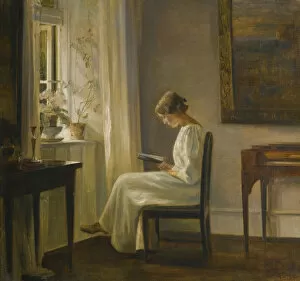 Carl 1863 1935 Gallery: Interior with a Woman Reading. Artist: Holsoe, Carl (1863-1935)