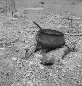 Wafer Iron Prints: Iron pot for heating... in the yard of Negro tobacco farmer