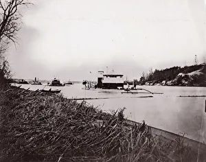 Ironclad fleet on James River below Rebel Howlett House Battery, 1865